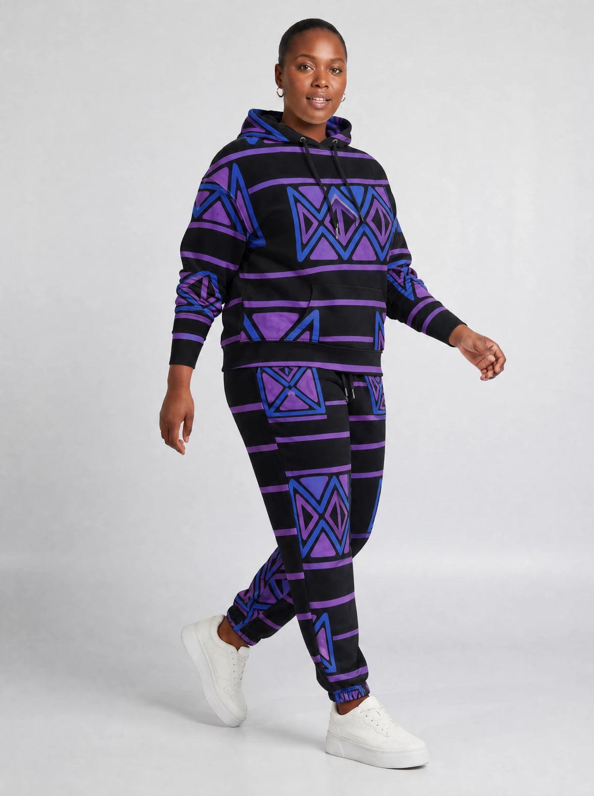 "Jioni" Black Violet Hoodie & Jogger Set — walking three-quarter view on model