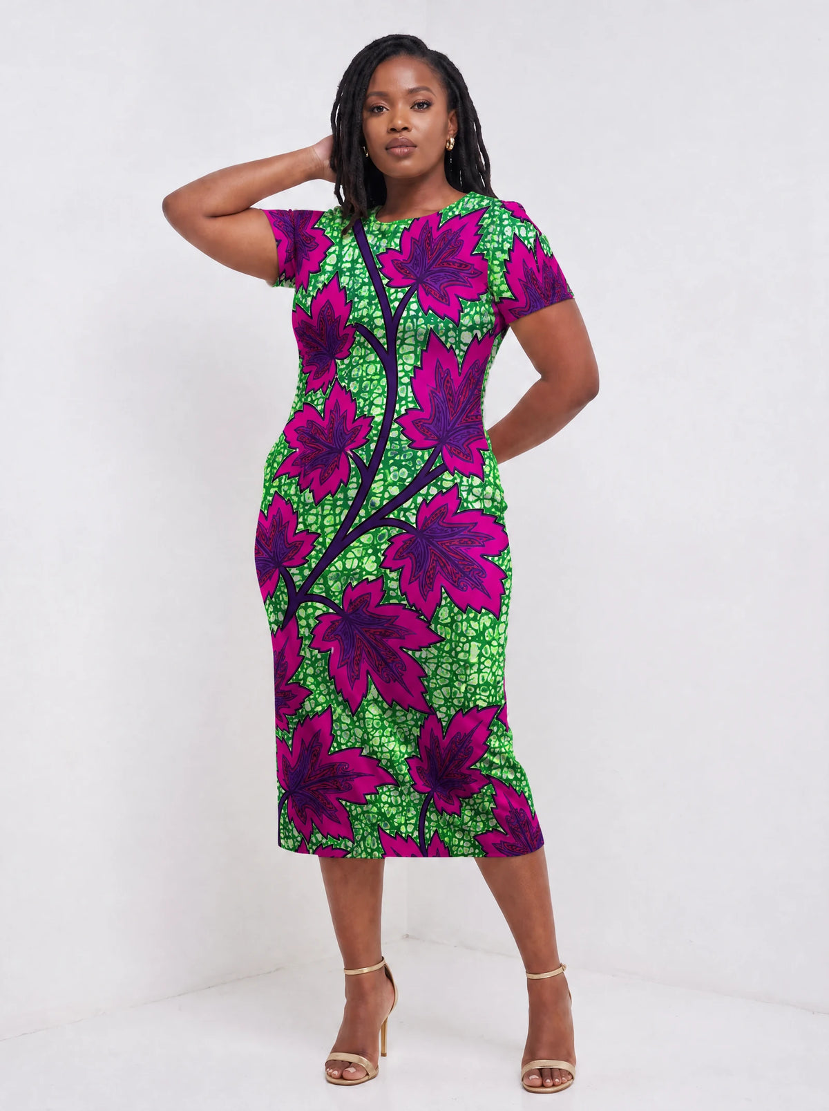 "Mzabibu" Sweetheart Midi Dress — three-quarter view on model