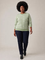 "Oshun Verde" Sweatshirt — three-quarter view on model