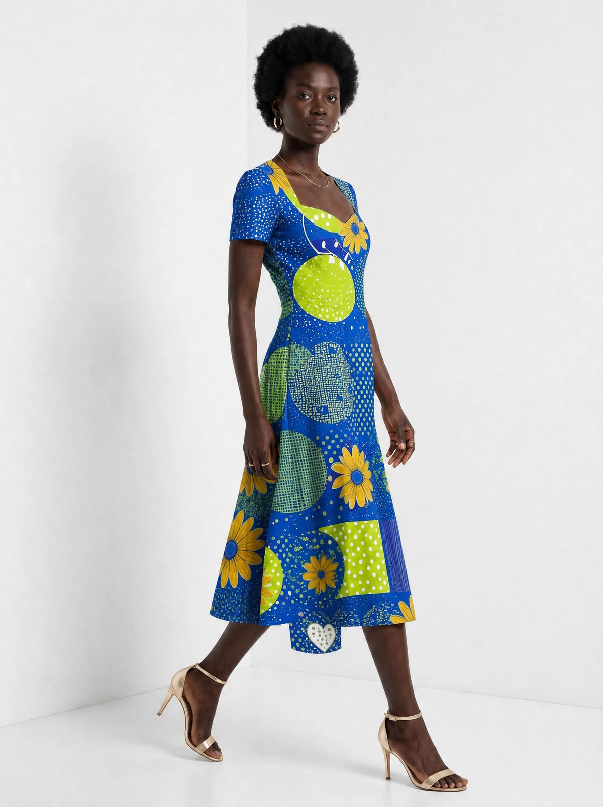 "Mchezo" Sweetheart Midi Dress — three-quarter view on model