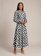 "Zamu" Long Puff Sleeve Dress — walking, three-quarter view on model