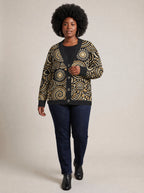 "Sahara" Knitted Cardigan — three-quarter view on model