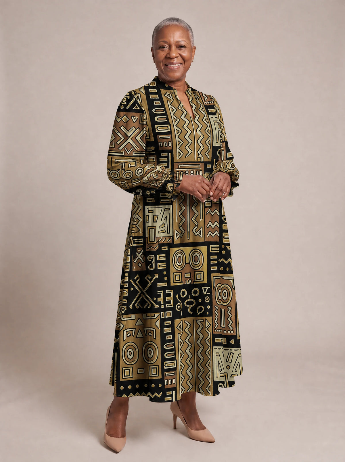 "Sankofa" Long Puff Sleeve Dress — walking, three-quarter view on model