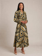 "Ashanti" Long Puff Sleeve Dress — walking, three-quarter view on model