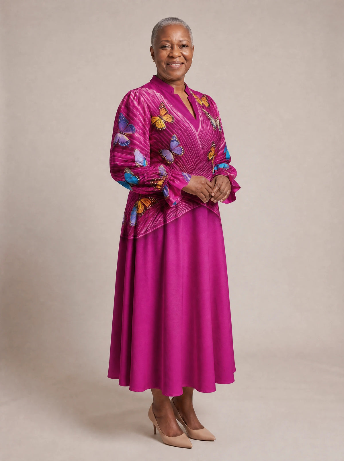 "Kipepeo" Long Puff Sleeve Dress — walking, three-quarter view on model