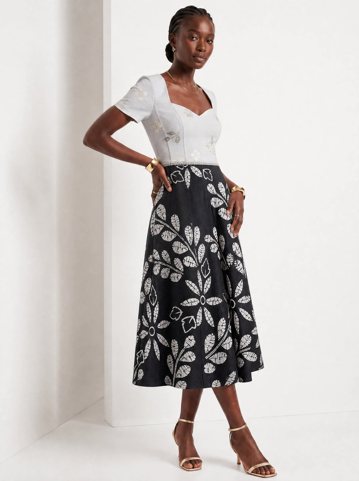 "Kivuli" Sweetheart Midi Dress — three-quarter view on model