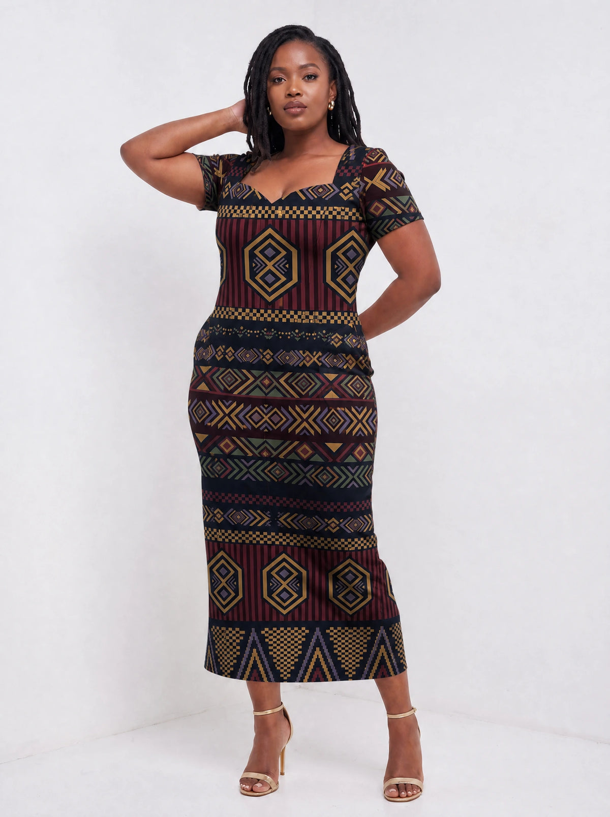 "Msuko" Sweetheart Midi Dress — three-quarter view on model