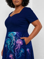 "Bahari" Sweetheart Midi Dress — close-up on model, hand in pocket