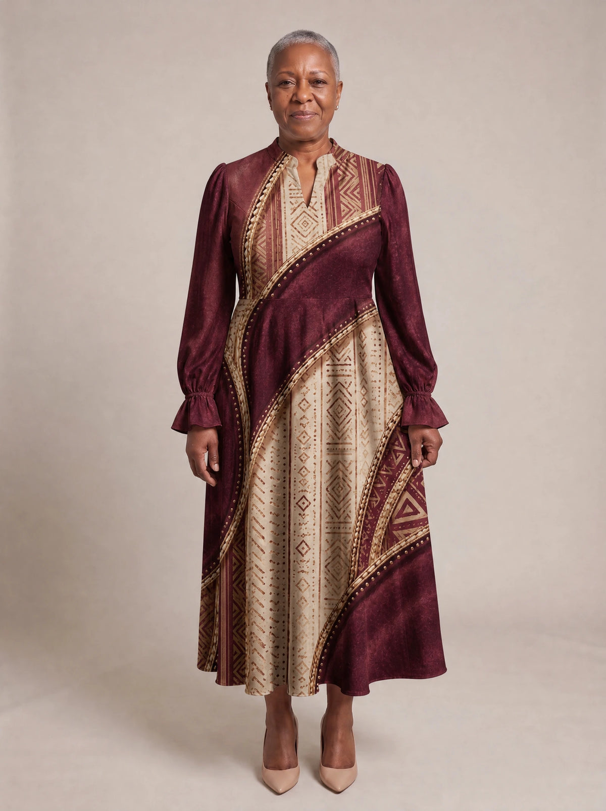 "Tapa" Long Puff Sleeve Dress — standing, angled view on model