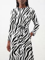 "Milia" Viscose Midi Dress — close-up of the tie sash and the in-seam side pocket