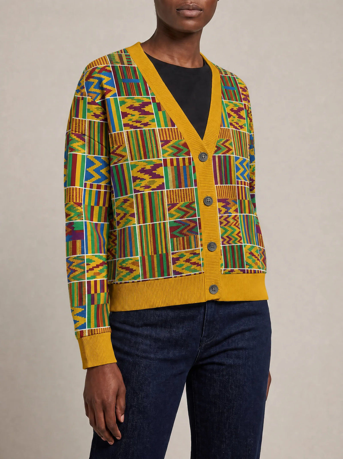"Shangwe" Cardigan — close view of the V-neck, buttons and ribbed trims
