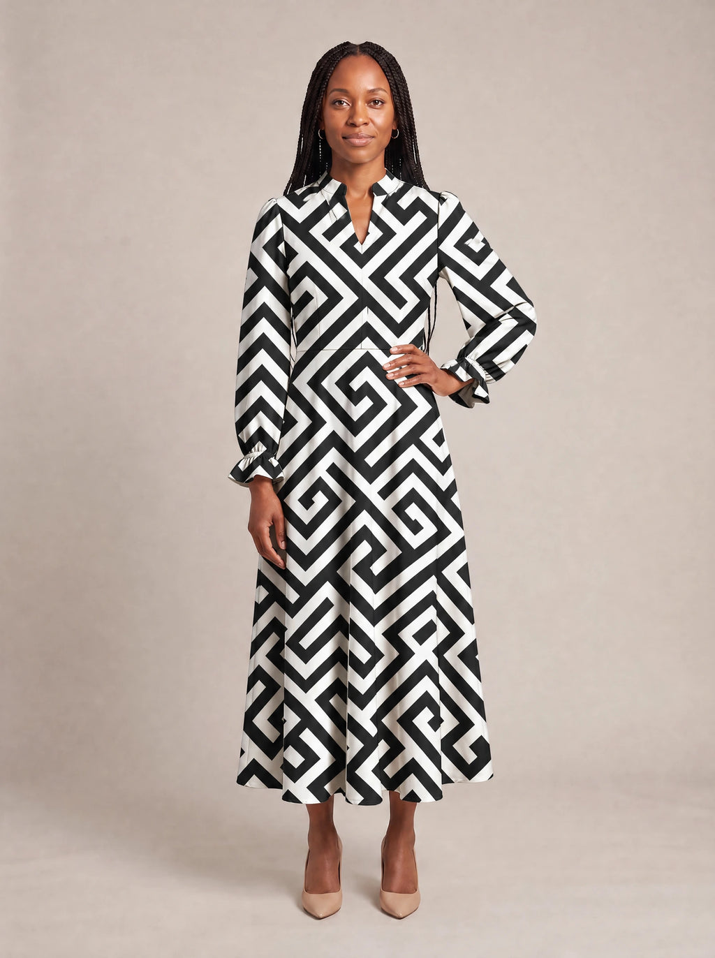 "Zamu" Long Puff Sleeve Dress — standing, angled view on model