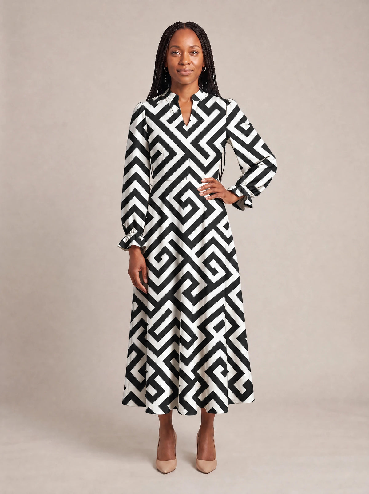 "Zamu" Long Puff Sleeve Dress — standing, angled view on model