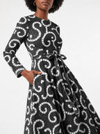 "Duara" Viscose Midi Dress — close-up of the tie sash and the in-seam side pocket