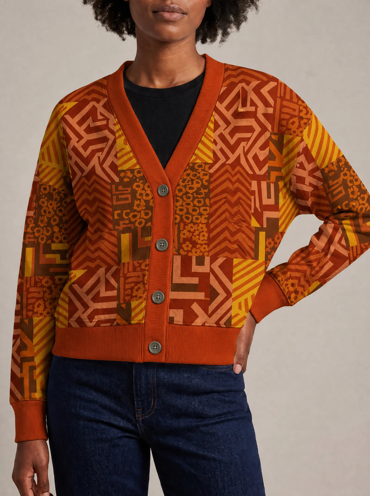 "Viraka" Cardigan — close view of the V-neck, buttons and ribbed trims