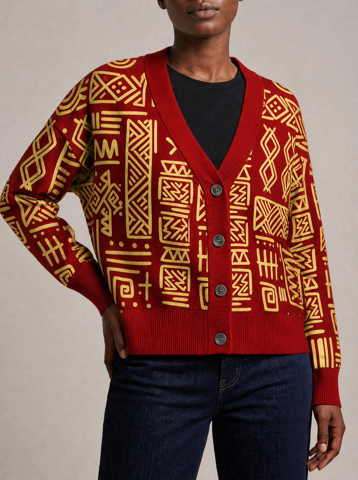 "Alama" Knitted Cardigan — close view of the V-neck, buttons and ribbed trims