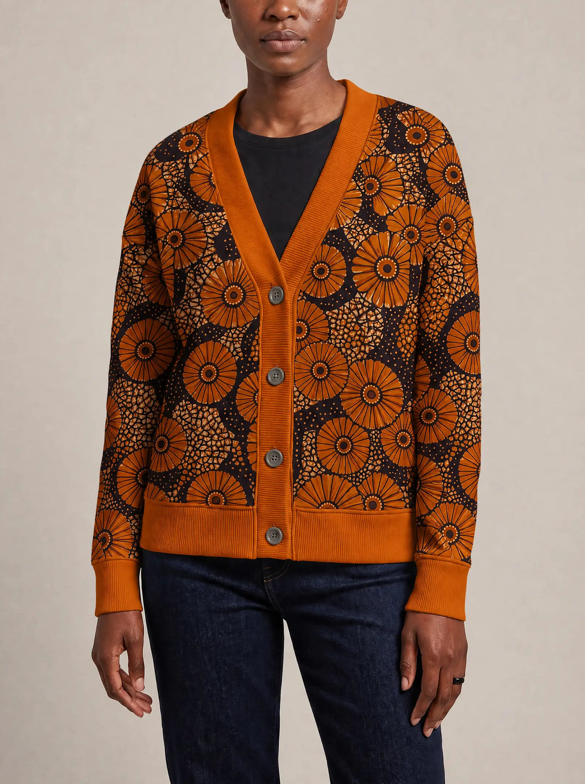 "Shada" Cardigan — close view of the V-neck, buttons and ribbed trims