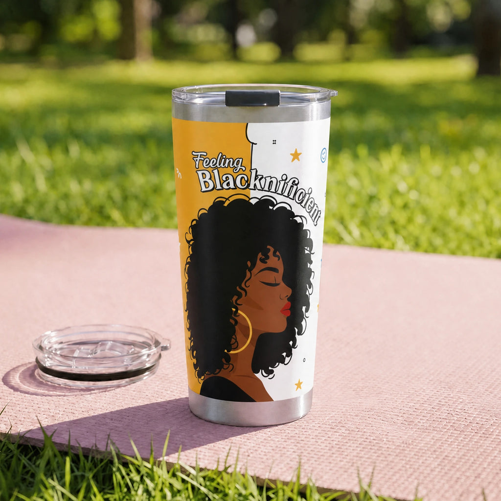 Feeling Blacknificient Tumbler — on a yoga mat on a park lawn