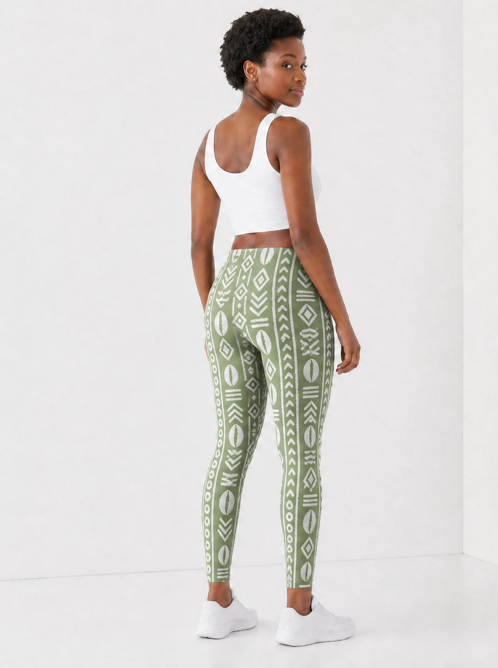 "Oshun Verde" Leggings — back view on model