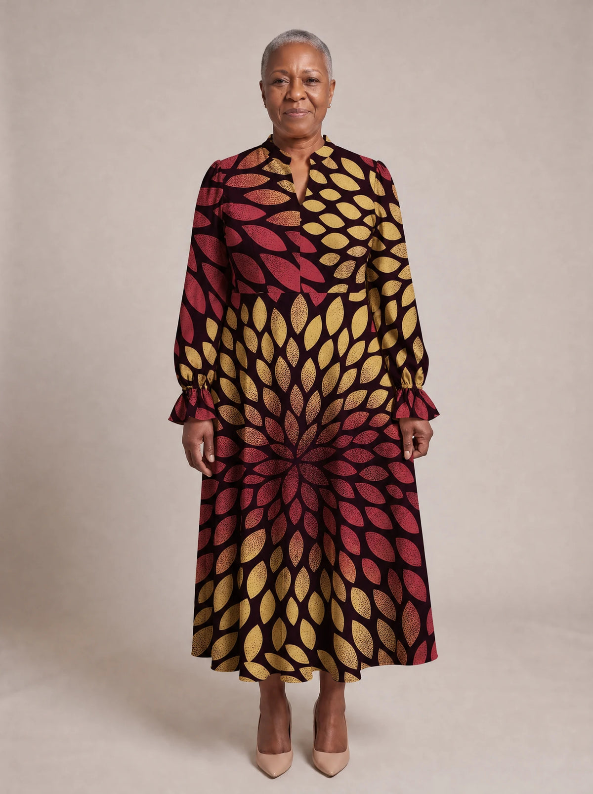 "Mavuno" Long Puff Sleeve Dress — standing, angled view on model