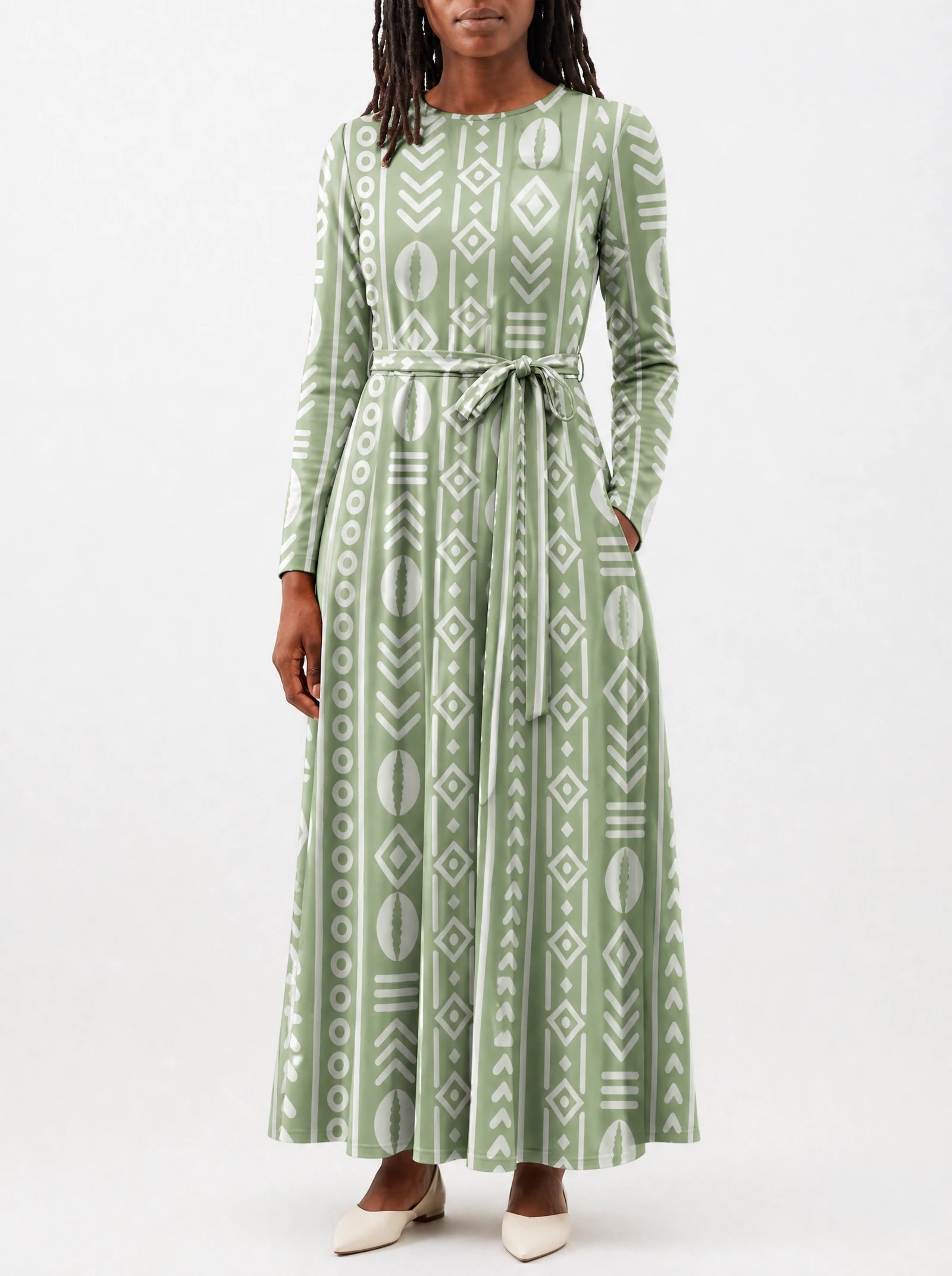 "Oshun Verde" Viscose Midi Dress — close-up of the tie sash and the in-seam side pocket