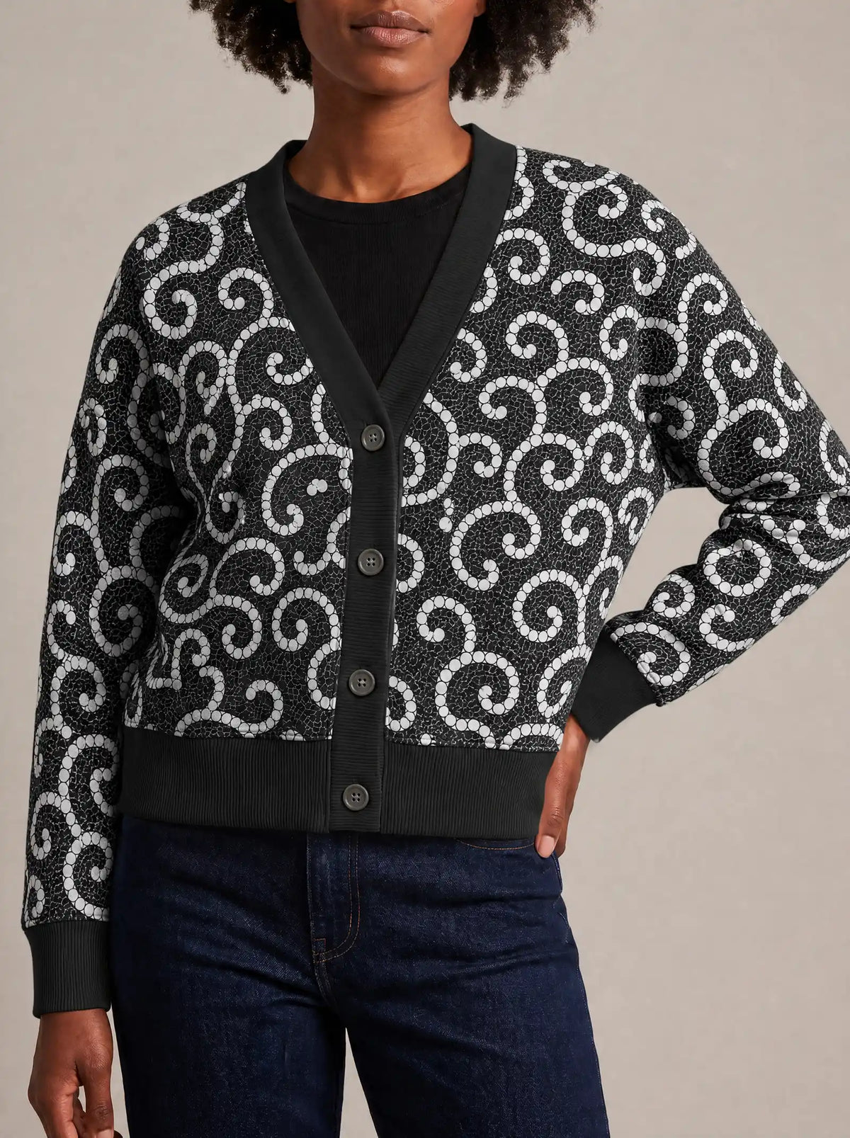 "Duara" Cardigan — close view of the V-neck, buttons and ribbed trims