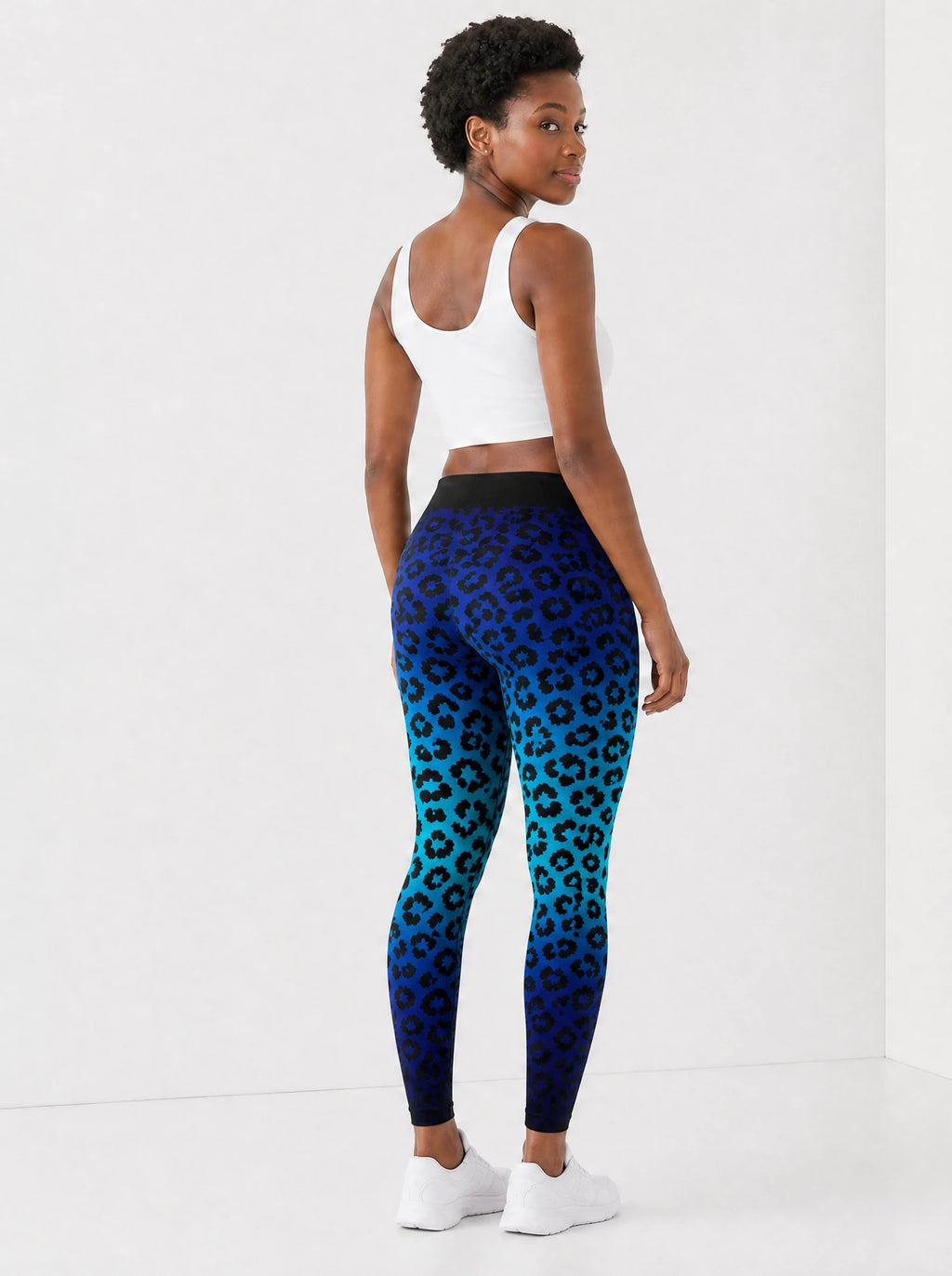 "Unstoppable" Sapphire Leopard Leggings — back view on model