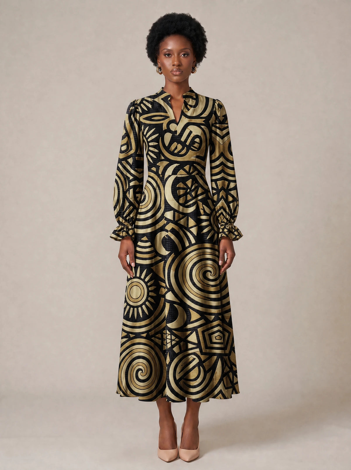 "Sahara" Long Puff Sleeve Dress — standing, angled view on model