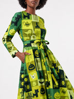 "Karamu" Halloween Long Sleeve Midaxi Dress — standing, angled view on model