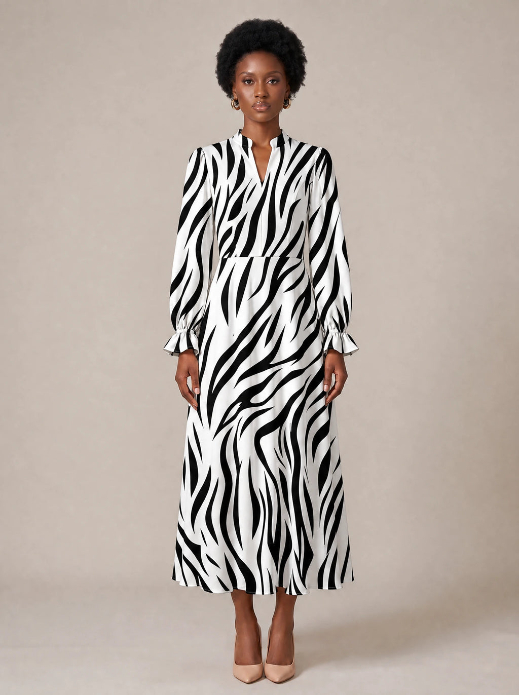 "Milia" Long Puff Sleeve Dress — standing, angled view on model
