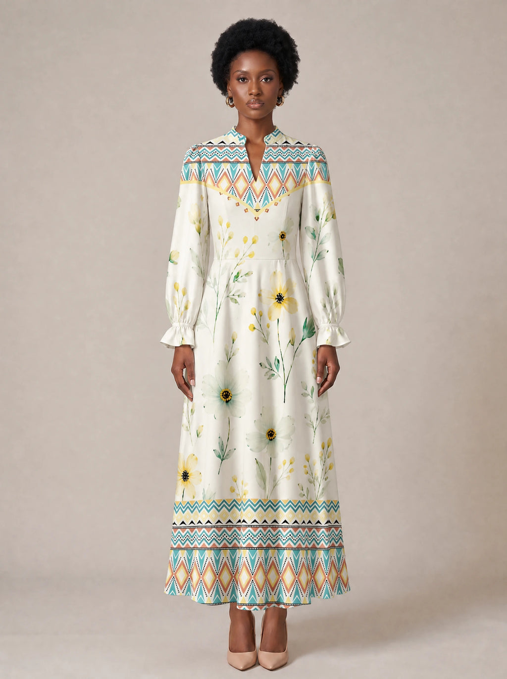 "Alizeti" Long Puff Sleeve Dress — standing, angled view on model