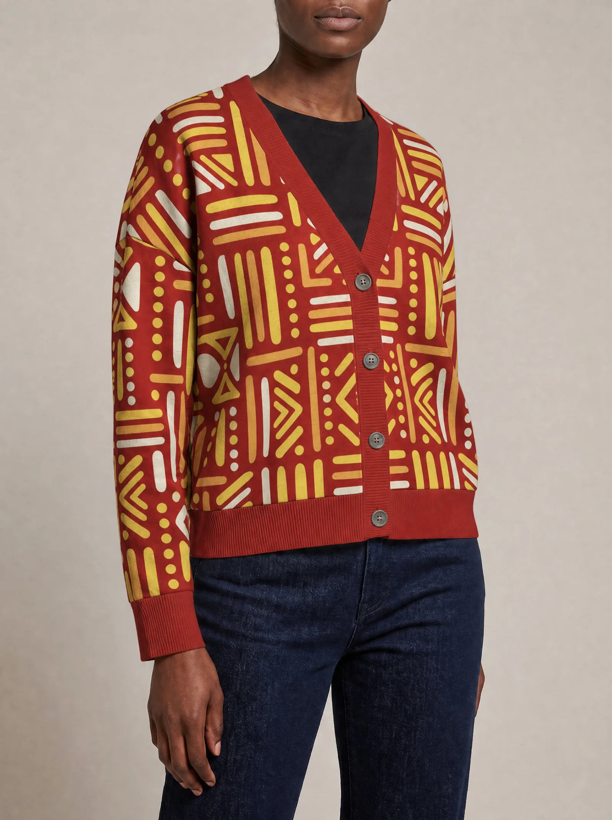 "Mistari" Cardigan — close view of the V-neck, buttons and ribbed trims