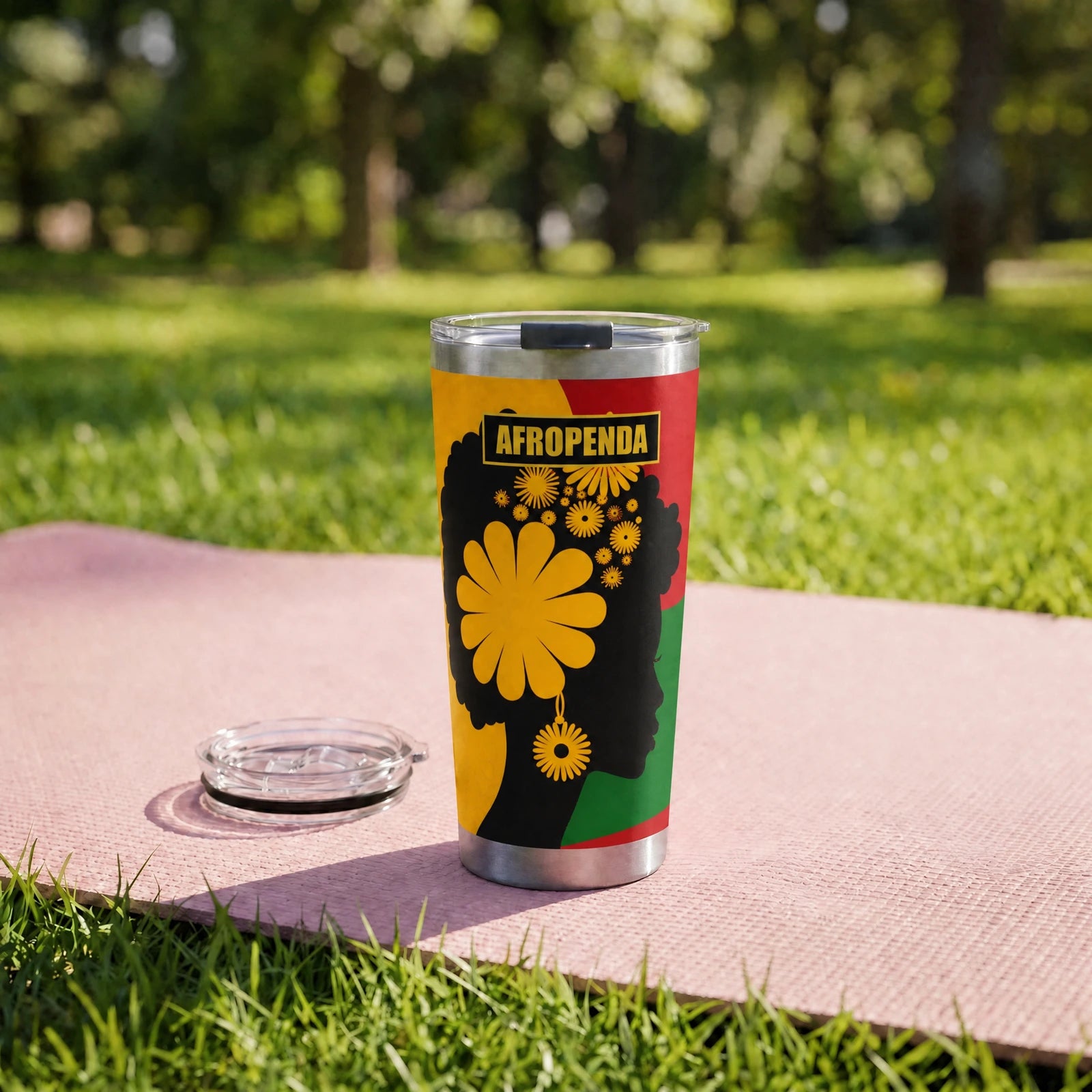 "Furaha" Tumbler — on a yoga mat on a park lawn