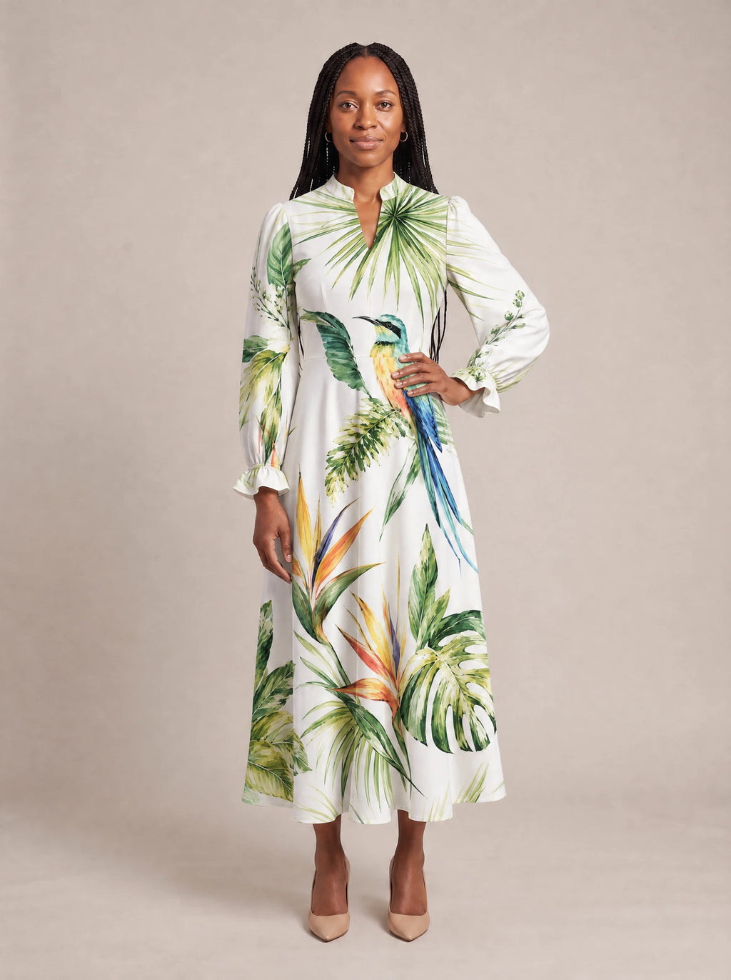 "Ndege" Long Puff Sleeve Dress — standing, angled view on model