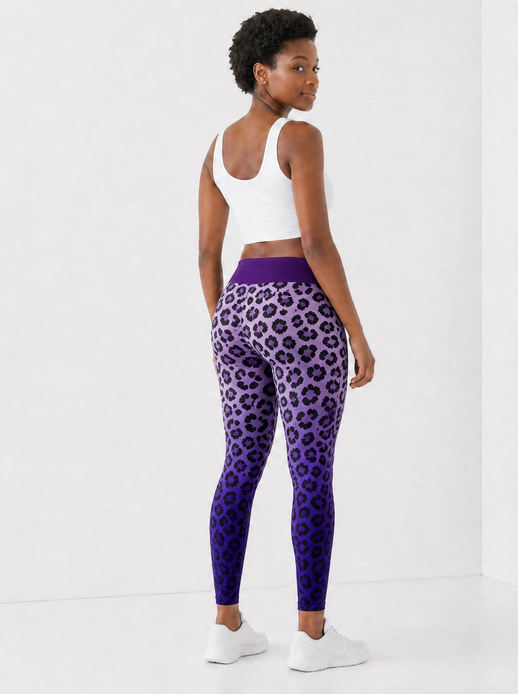 "Unstoppable" Amethyst Leopard Leggings — back view on model