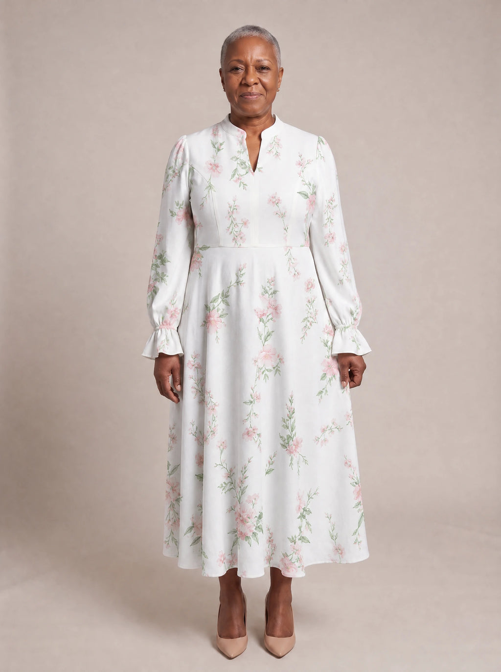 "Chanua" Long Puff Sleeve Dress — standing, angled view on model