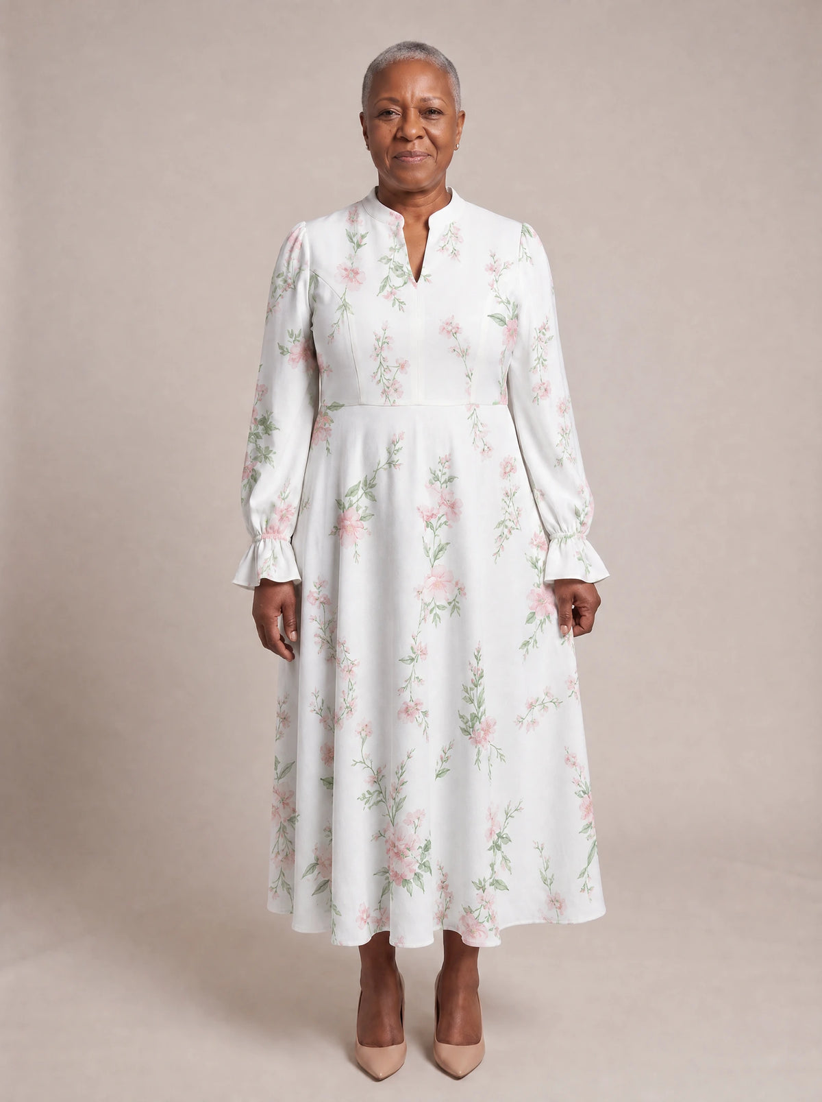 "Chanua" Long Puff Sleeve Dress — standing, angled view on model
