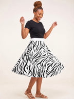 "Milia" Twirl Skirt — twirling, skirt flared out
