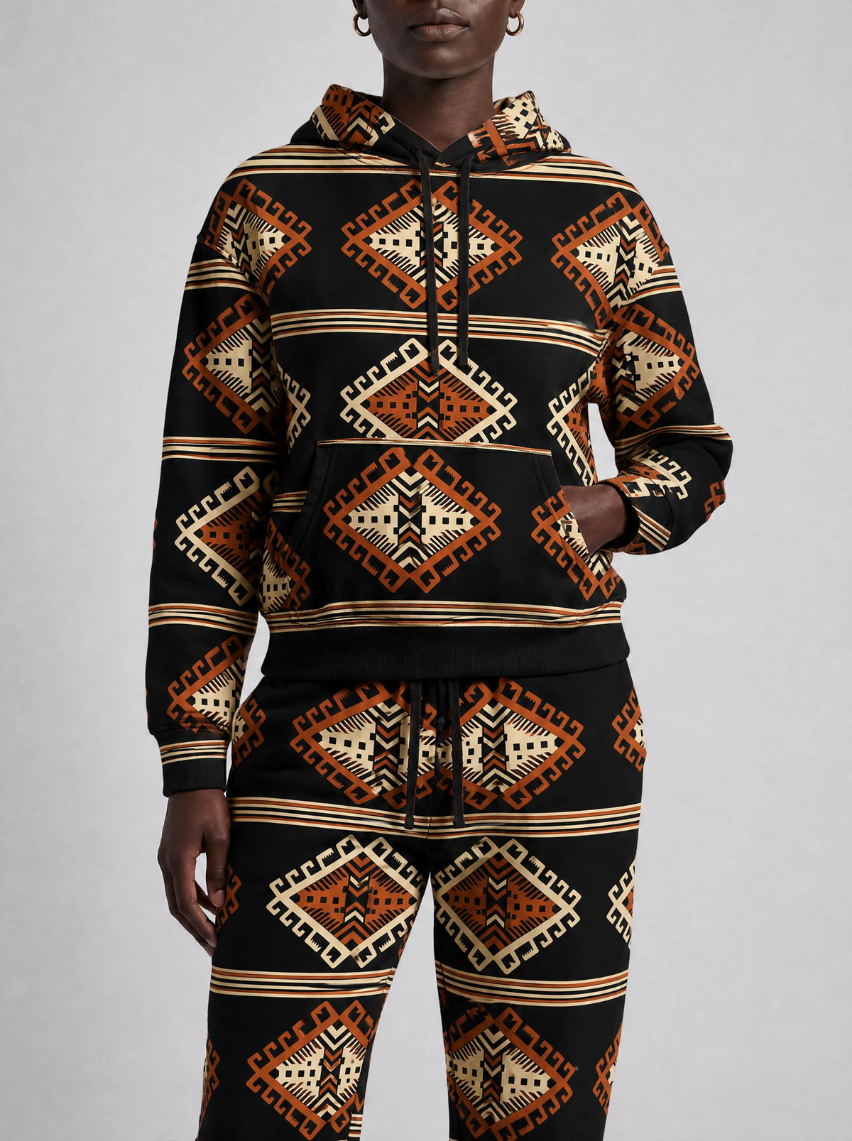 "Cheche" Black Ember Hoodie & Jogger Set — close view of the pocket, hem band and jogger waistband