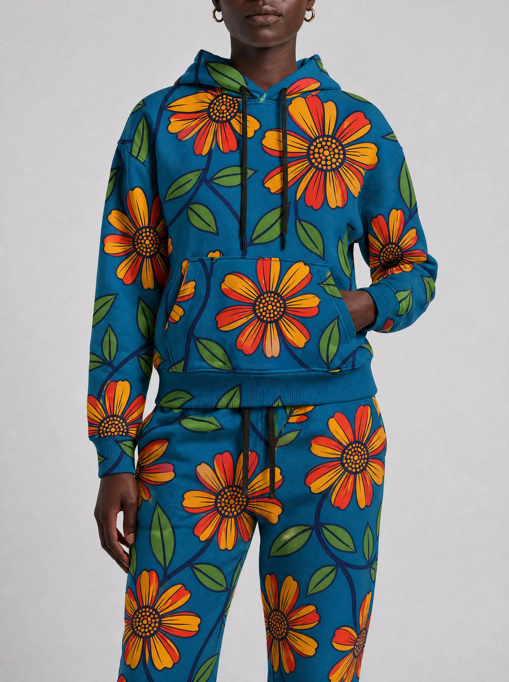 "Kitalu" Teal Poppy Hoodie & Jogger Set — close view of the pocket, hem band and jogger waistband