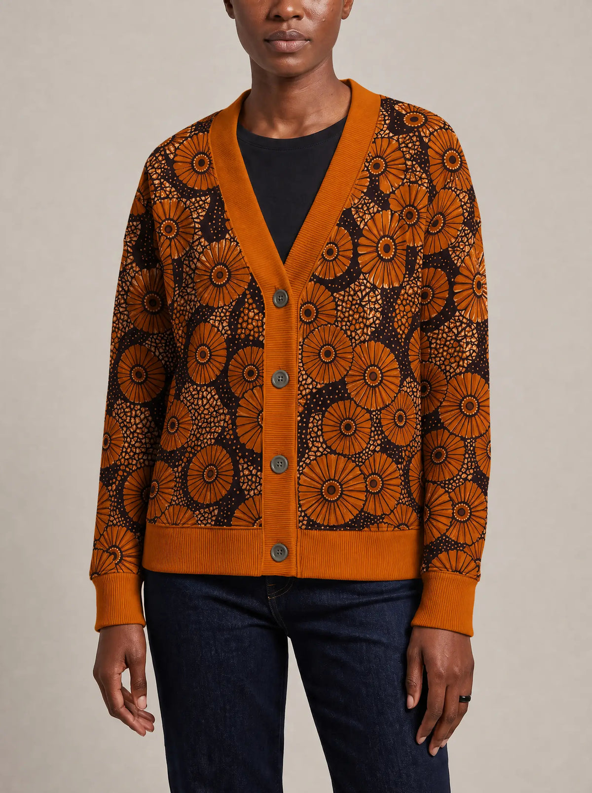 "Shada" Cardigan — close view of the V-neck, buttons and ribbed trims