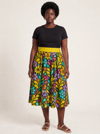 "Njano" Twirl Skirt — full length on model