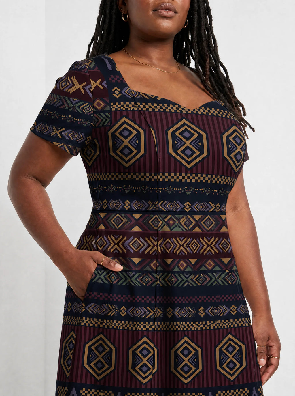"Msuko" Sweetheart Midi Dress — close-up of the bodice and the in-seam side pocket