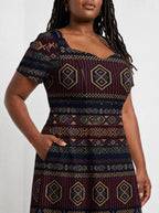 "Msuko" Sweetheart Midi Dress — close-up of the bodice and the in-seam side pocket