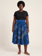 "Pwani" Twirl Skirt — front view on model