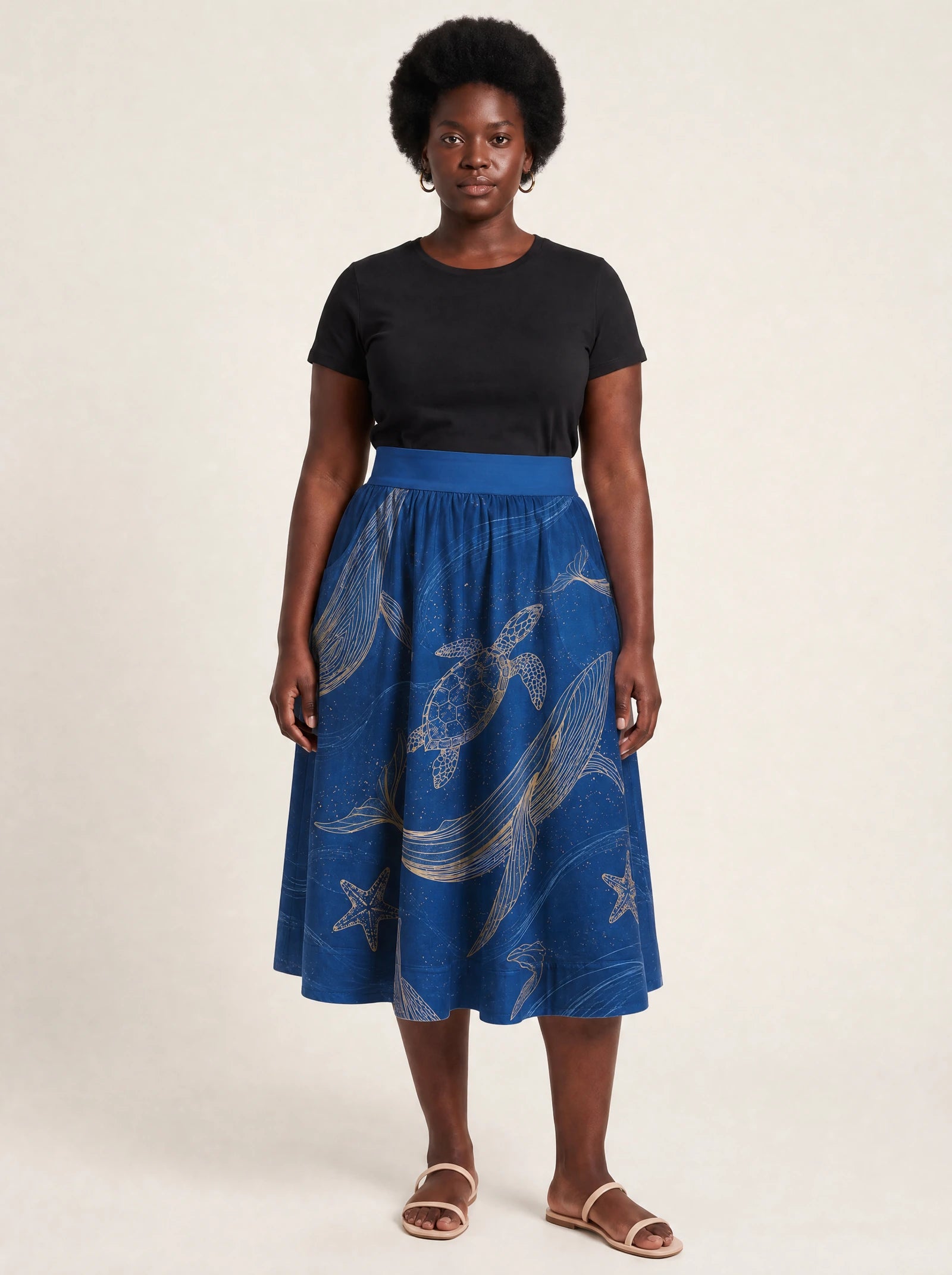 "Pwani" Twirl Skirt — front view on model