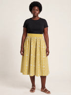 "Oshun Dhahabu" Twirl Skirt — front view on model