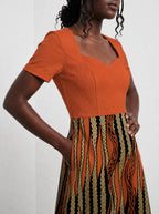 "Miali" Sweetheart Midi Dress — close-up of the bodice and the in-seam side pocket