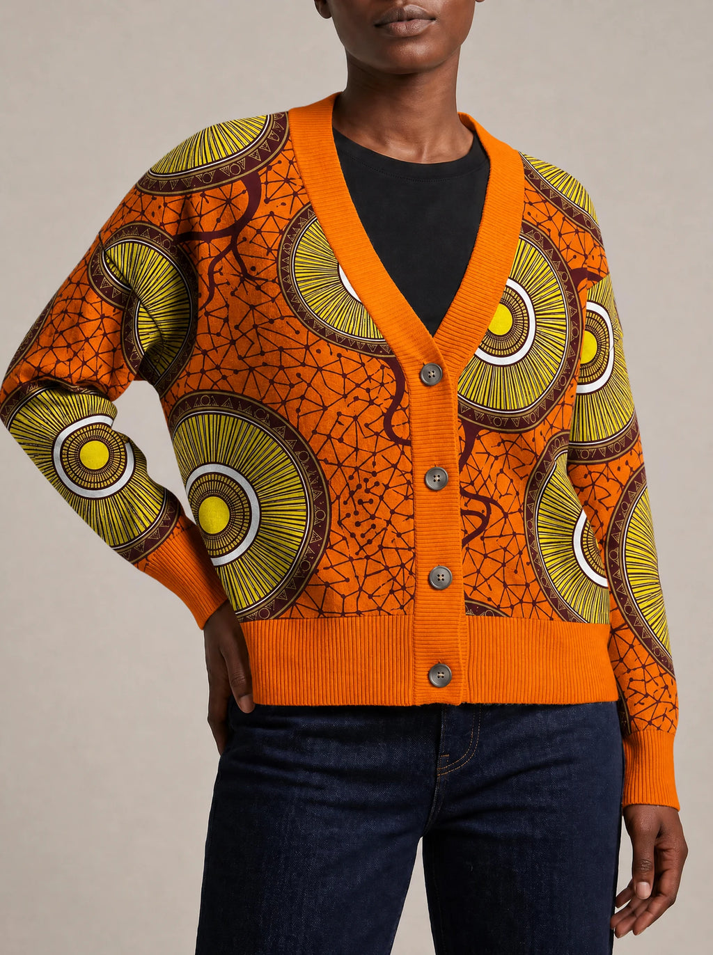 "Mchana" Knitted Cardigan — close view of the V-neck, buttons and ribbed trims