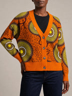 "Mchana" Knitted Cardigan — close view of the V-neck, buttons and ribbed trims